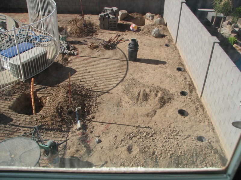 second-floor view of holes in backyard 4/25/2007